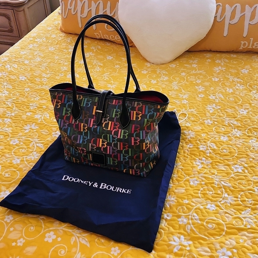 Dooney and Bourke black/multi color handbag with dustbag!